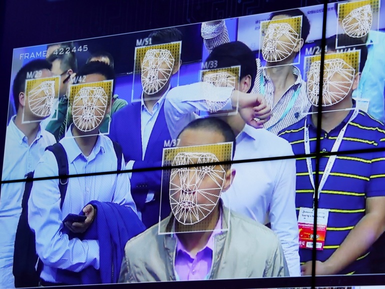 Visitors experience facial recognition technology at Face++ booth during the China Public Security Expo in Shenzhen, China October 30, 2017. Picture taken October 30, 2017. REUTERS/Bobby Yip