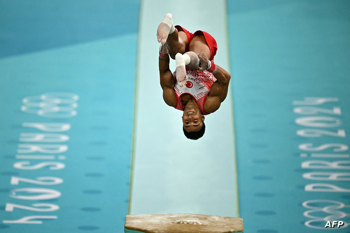 Turkey's Adem Asil competes in the vault event of the artistic gymnastics men's qualification during the Paris 2024 Olympic…
