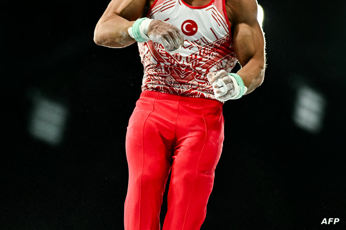 Turkey's Adem Asil competes in the rings event of the artistic gymnastics men's qualification during the Paris 2024 Olympic…