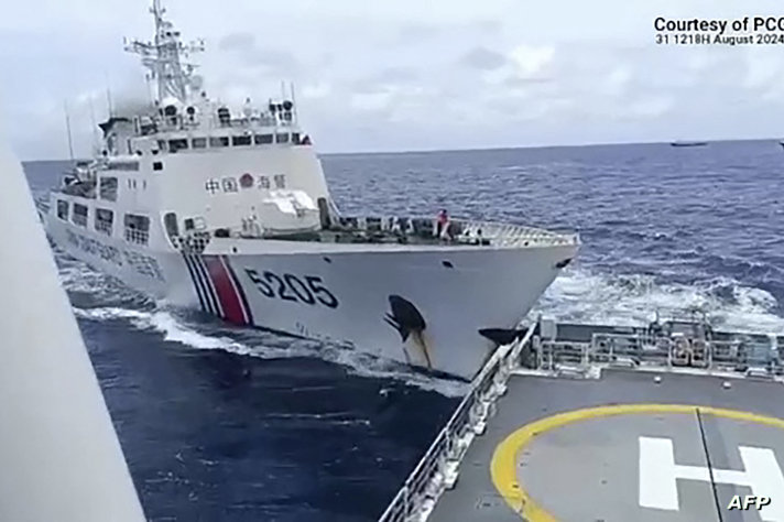 This frame grab from handout video footage taken and released on August 31, 2024 by the Philippine Coast Guard (PCG) shows a…
