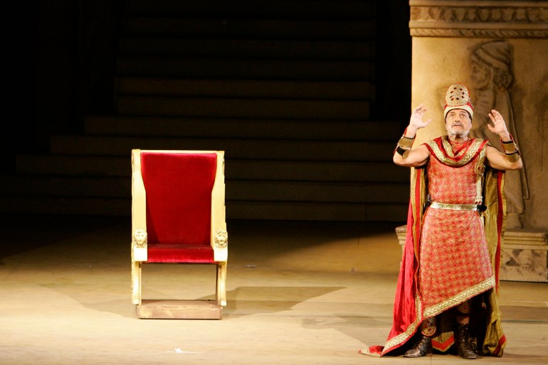 Actor Antoine Kerbaj performs during a scene from the historical epic musical play "Return of the Phoenix" by Oussama Rahbani in the ancient city of Byblos northern Lebanon August 19, 2008. The play is part of the International Festival of Byblos. Picture taken August 19, 2008. REUTERS/ Cynthia Karam (LEBANON)