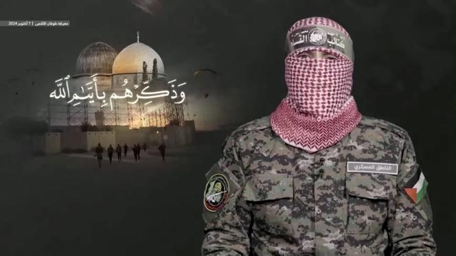 شخص مقنع ، والذي سيكون أبو أوبيدا ، المتحدث الرسمي باسم 